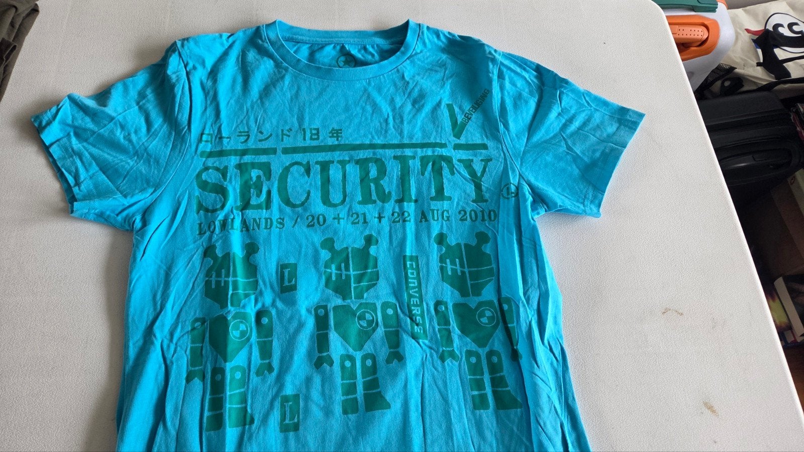 Converse Lowlands 2010 Security T-shirt Maat L, Maat 52/54 (L), Converse, Gedragen, Verzenden
