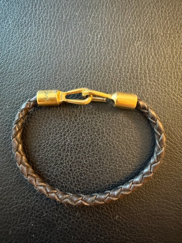Yves Saint Laurent Black leather braided bracelet, Ophalen of Verzenden, Gebruikt, Zwart, Overige materialen