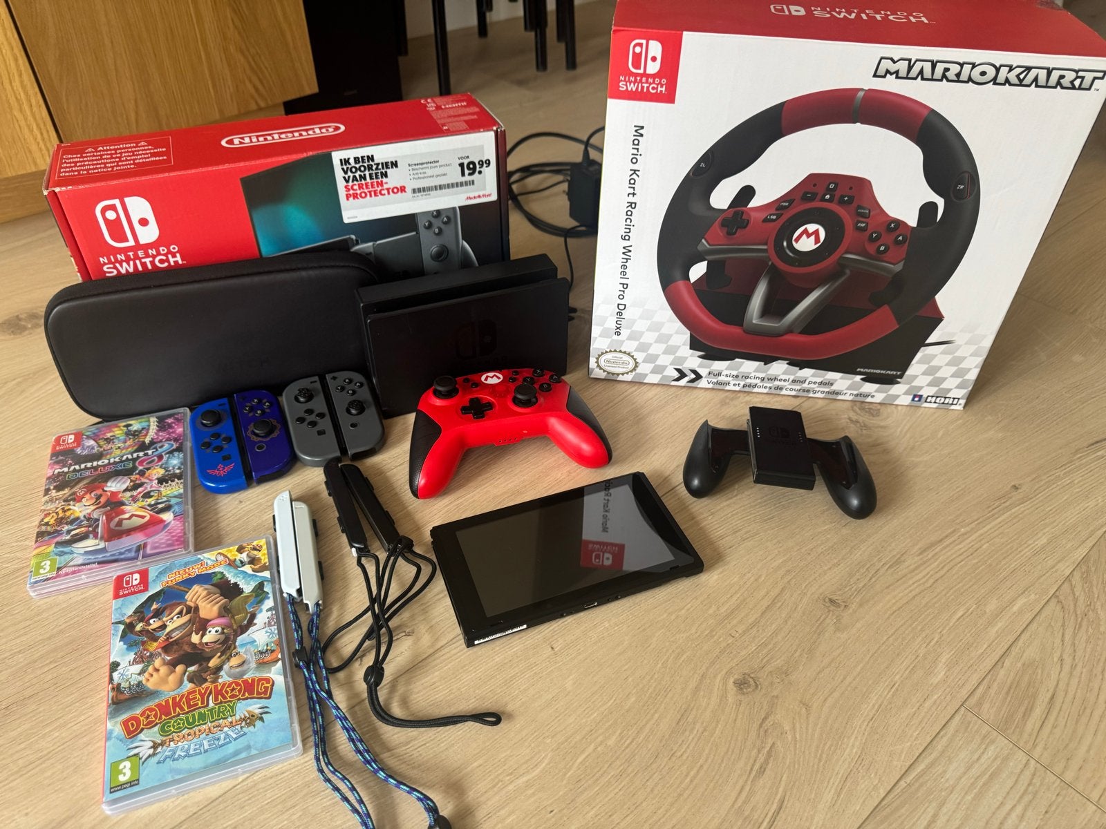 Nintendo Switch bundel met games, controllers en racestuur, Ophalen, Switch Original, Met 3 controllers of meer, Gebruikt