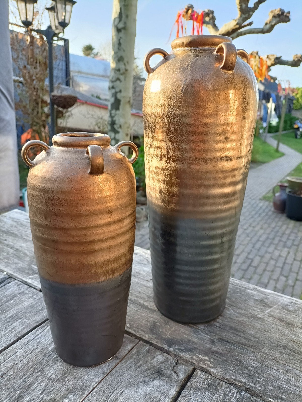 2 mooie hoge PTMD vazen. Goudkleurig., Ophalen