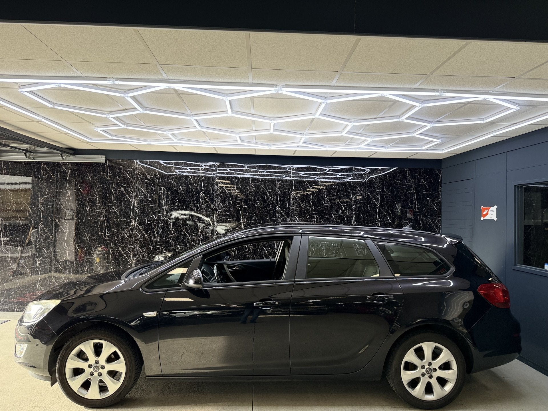 Opel Astra Sports Tourer 1.4 Turbo Edition (bj 2011), Auto's, Voorwielaandrijving, Euro 5, Stof, Gebruikt