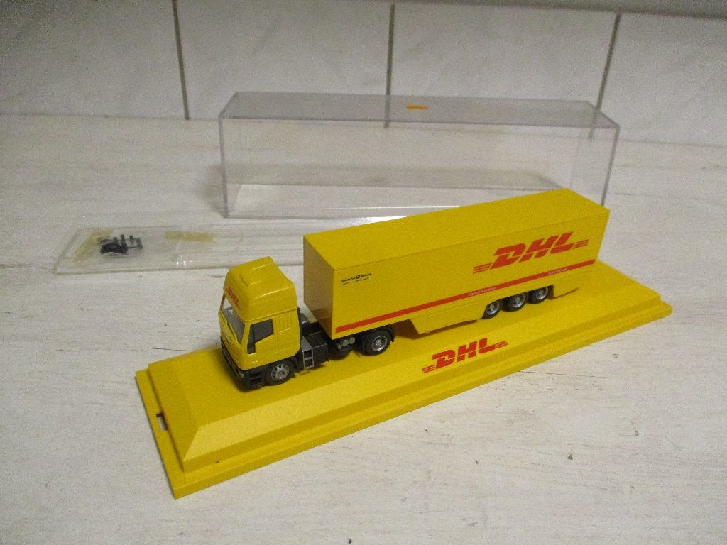 Rietze Iveco met DHL Oplegger Schaal 1:87, Ophalen of Verzenden, Zo goed als nieuw, Bus of Vrachtwagen, Rietze