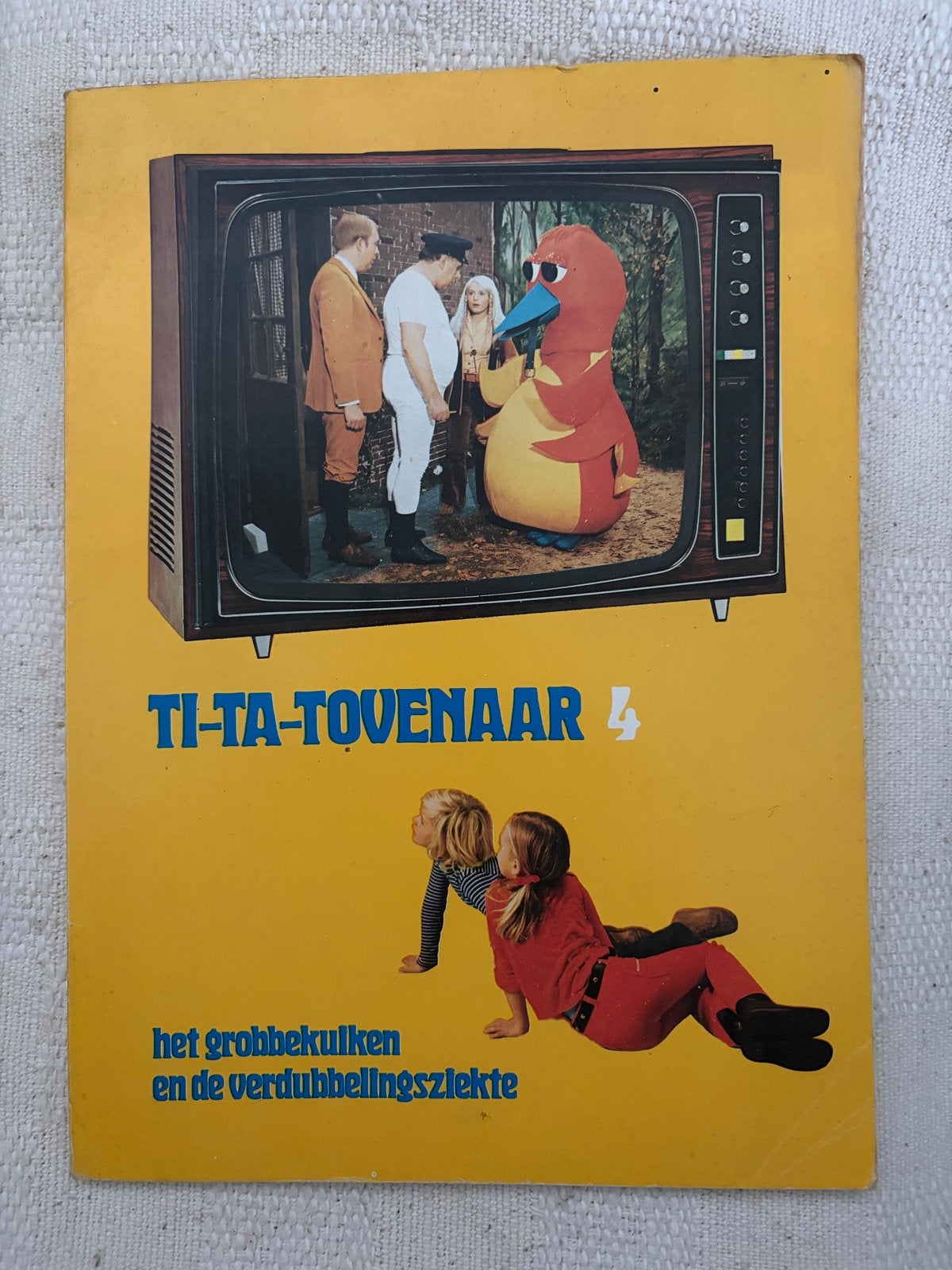 Ti-Ta-Tovenaar 4: Het Grobbekuiken en de Verdubbelingsziekte, Ophalen of Verzenden, Gelezen, Fictie algemeen