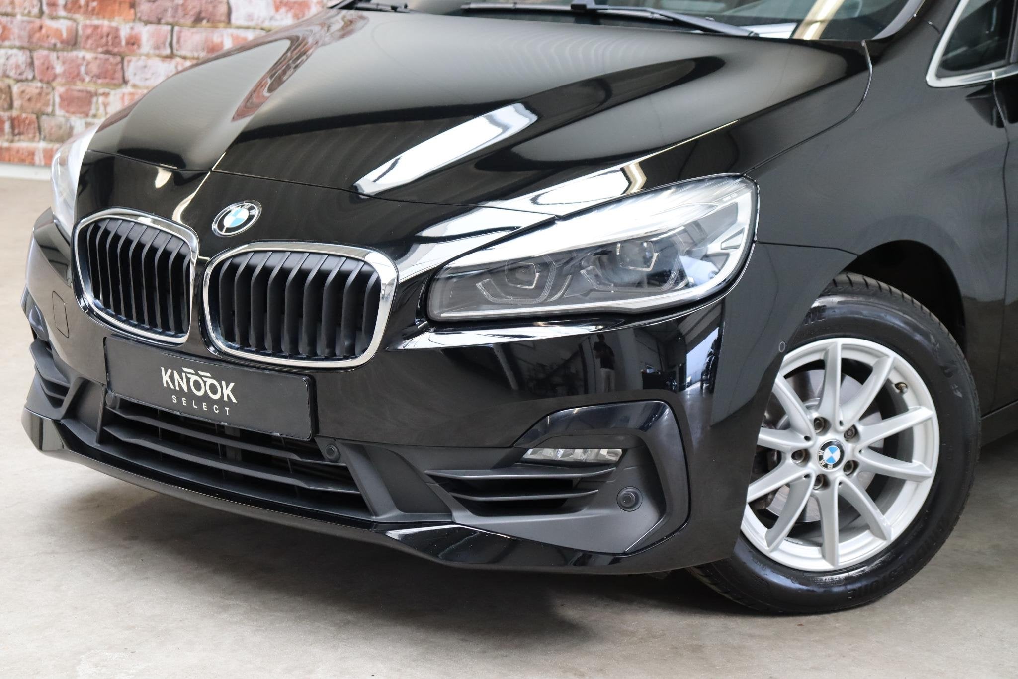 BMW 2-serie Active Tourer 218i Executive Automaat / Navigati, Auto's, Stof, Gebruikt, Euro 6, Automatische klimaatregeling