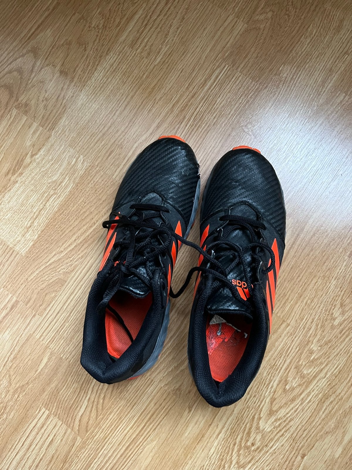 Adidas hockeyschoenen - Maat 39 1/3 - Zwart/Oranje, Ophalen, Gebruikt, Schoenen