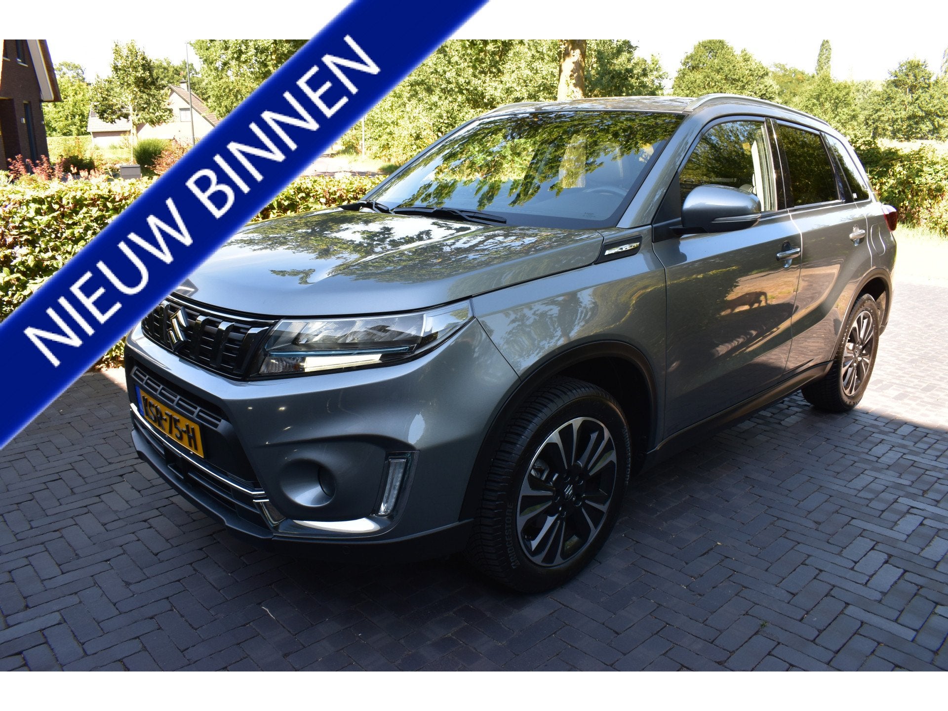 Suzuki Vitara 1.4 Boosterjet Style Hybrid Pano Leer NIEUWST!, Dealer onderhouden, Gebruikt, 4 cilinders, Leder en Stof