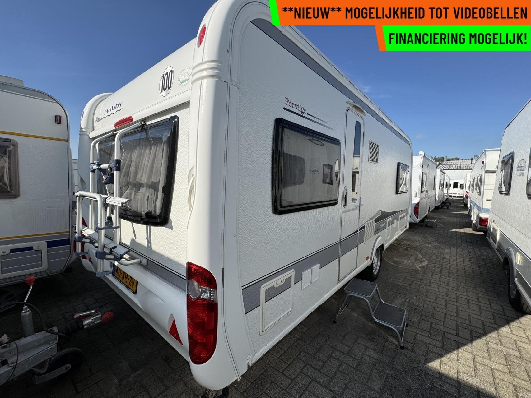 Hobby 560 UL PRESTIGE, ENKELE BEDDEN, MOVER, VOORTENT, Caravans en Kamperen, Rondzit, Hobby, 7 tot 8 meter, Bedrijf