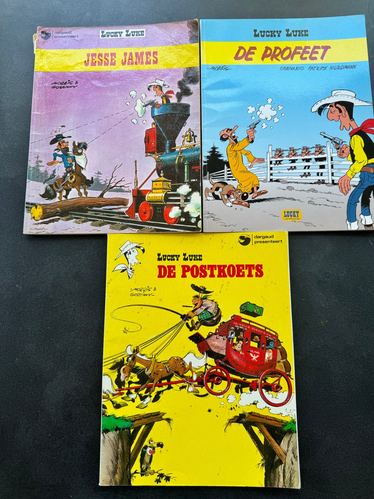 Lucky Luke stripboeken: Jesse James, De Profeet, De Postkoet, Meerdere stripboeken, Ophalen of Verzenden, Gelezen