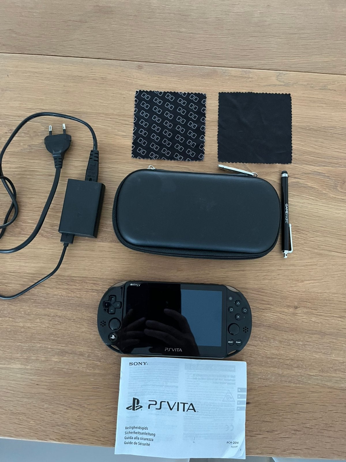 Sony PS Vita Slim PCH-2016+64GB origineel+oplader+hoes, Ophalen of Verzenden, Gebruikt, Zwart, Overige modellen
