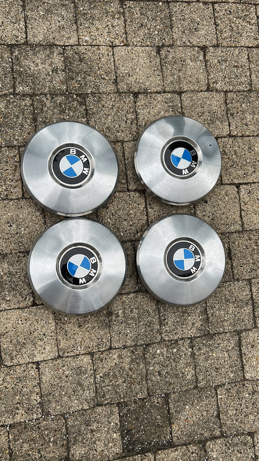 BMW originele naafdeksels/wieldeksels 4 stuks, Auto diversen, Ophalen of Verzenden, Zo goed als nieuw