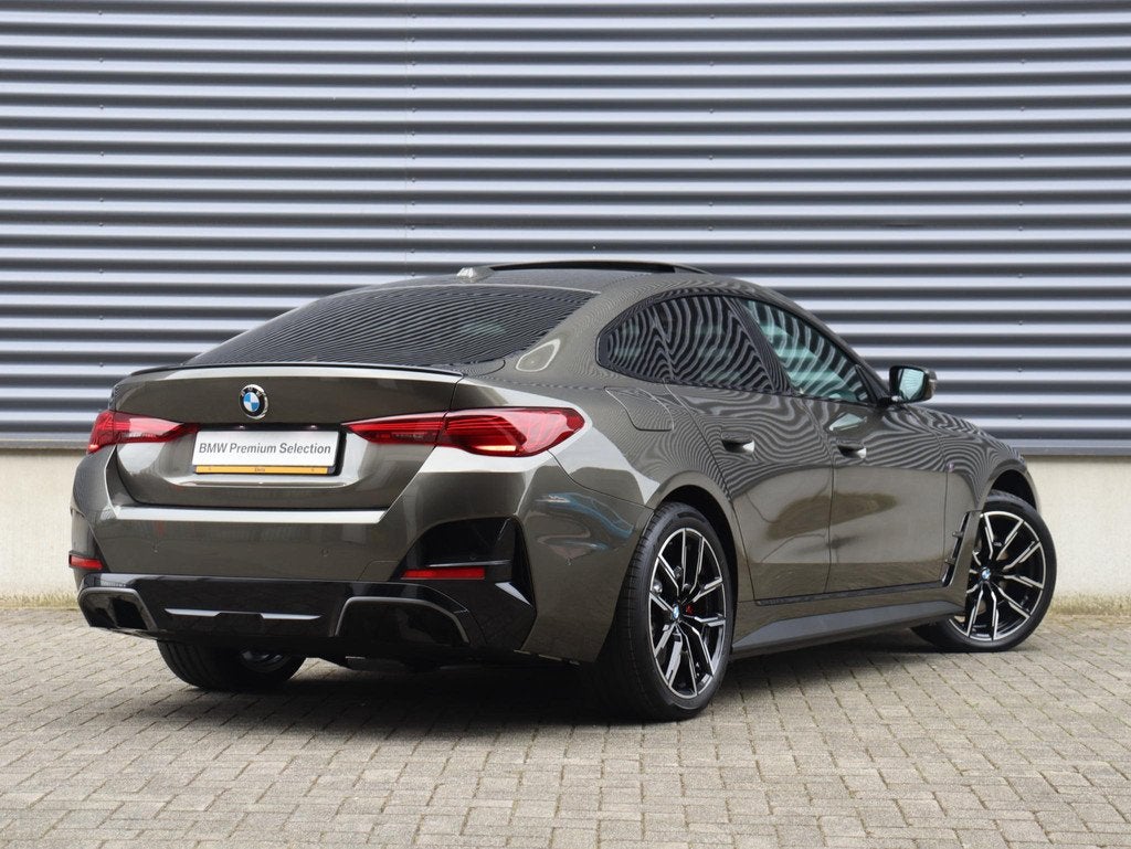 BMW i4 eDrive35 | M Sportpakket Pro | Panodak | Individual L, Auto's, BMW, Stuurwielverwarming, Zwart, Met garantie (alle), 31 min