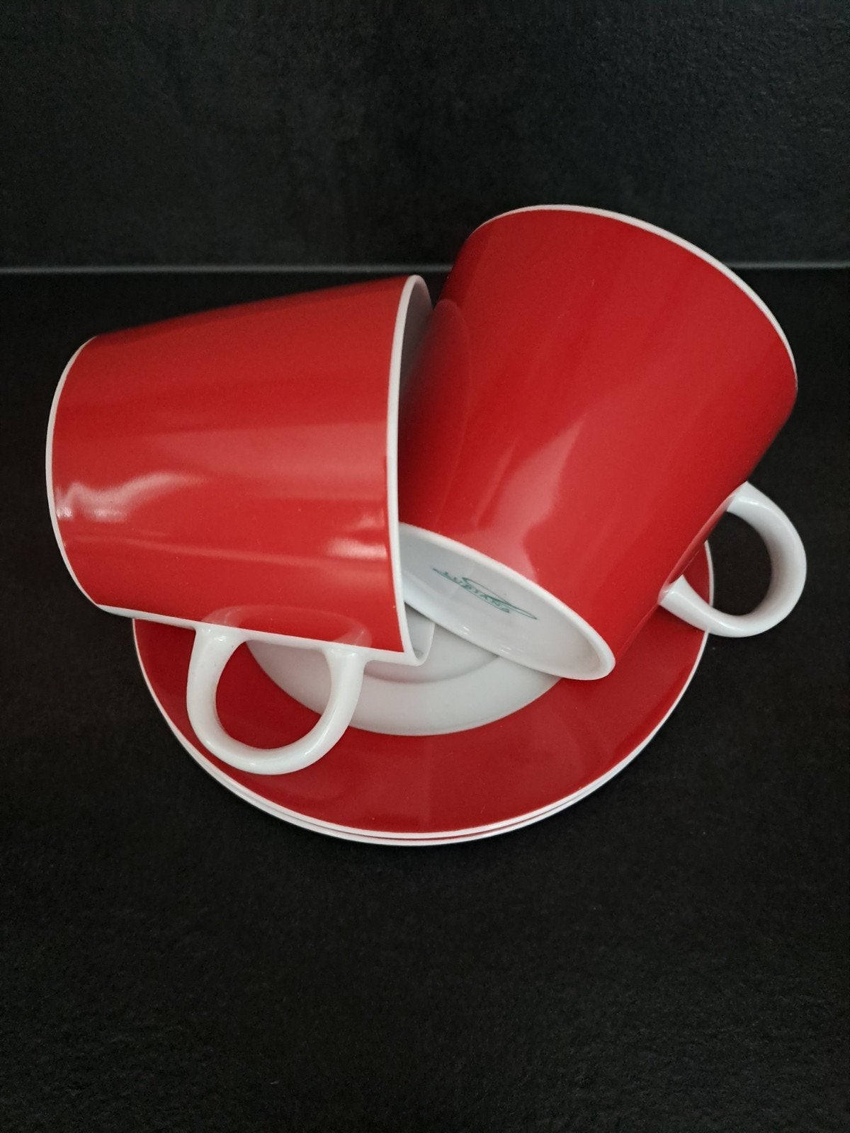 set kop en schotels rood 2 stuks, Overige merken, Ophalen of Verzenden, Zo goed als nieuw, Overige stijlen