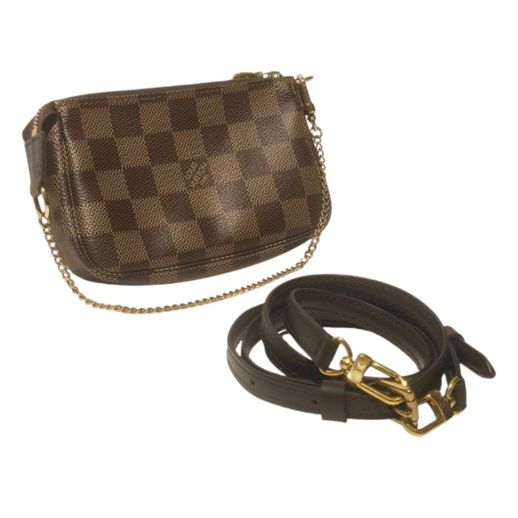 Louis Vuitton N58009 Mini Pochette Damier 2020 | Nette Staat, Louis Vuitton, Gebruikt, Support@louisvuitton.com, 2 Rue du Pont Neuf
75001 Paris
France