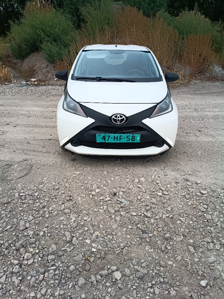 Toyota Aygo 1.0 12V Vvt-i Ddrs 2016 Wit, Auto's, Toyota, Voorwielaandrijving, Stof, Zwart, 4 stoelen