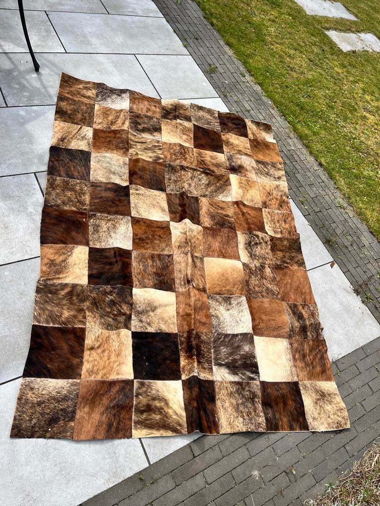 Koeienhuid patchwork vloerkleed - diverse bruintinten, Gebruikt, 100 tot 150 cm, Beige, Ophalen of Verzenden