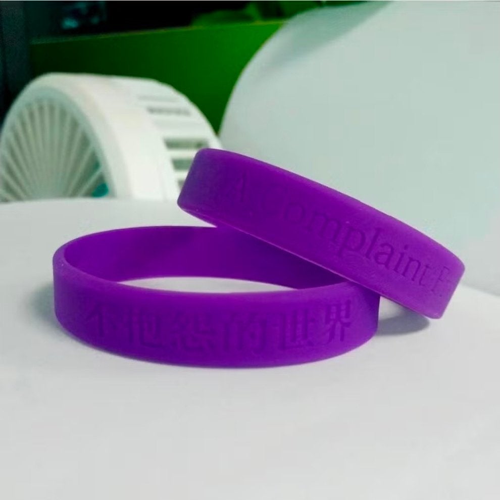 2 Siliconen armbandjes, Ophalen of Verzenden, Nieuw, Paars, Overige materialen