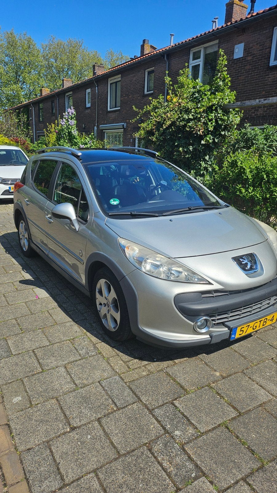 Peugeot 207 SW 1.6  | Panoramadak | Cruise | Climate, Auto's, Leder en Stof, 1110 kg, Origineel Nederlands, Stationwagon