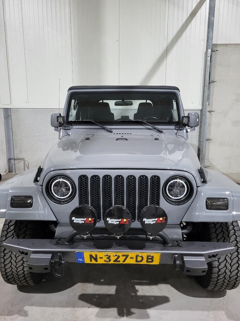 Jeep Wrangler 4.0i Soft top, Auto's, 450 kg, Zwart, 4 stoelen, Leder en Stof