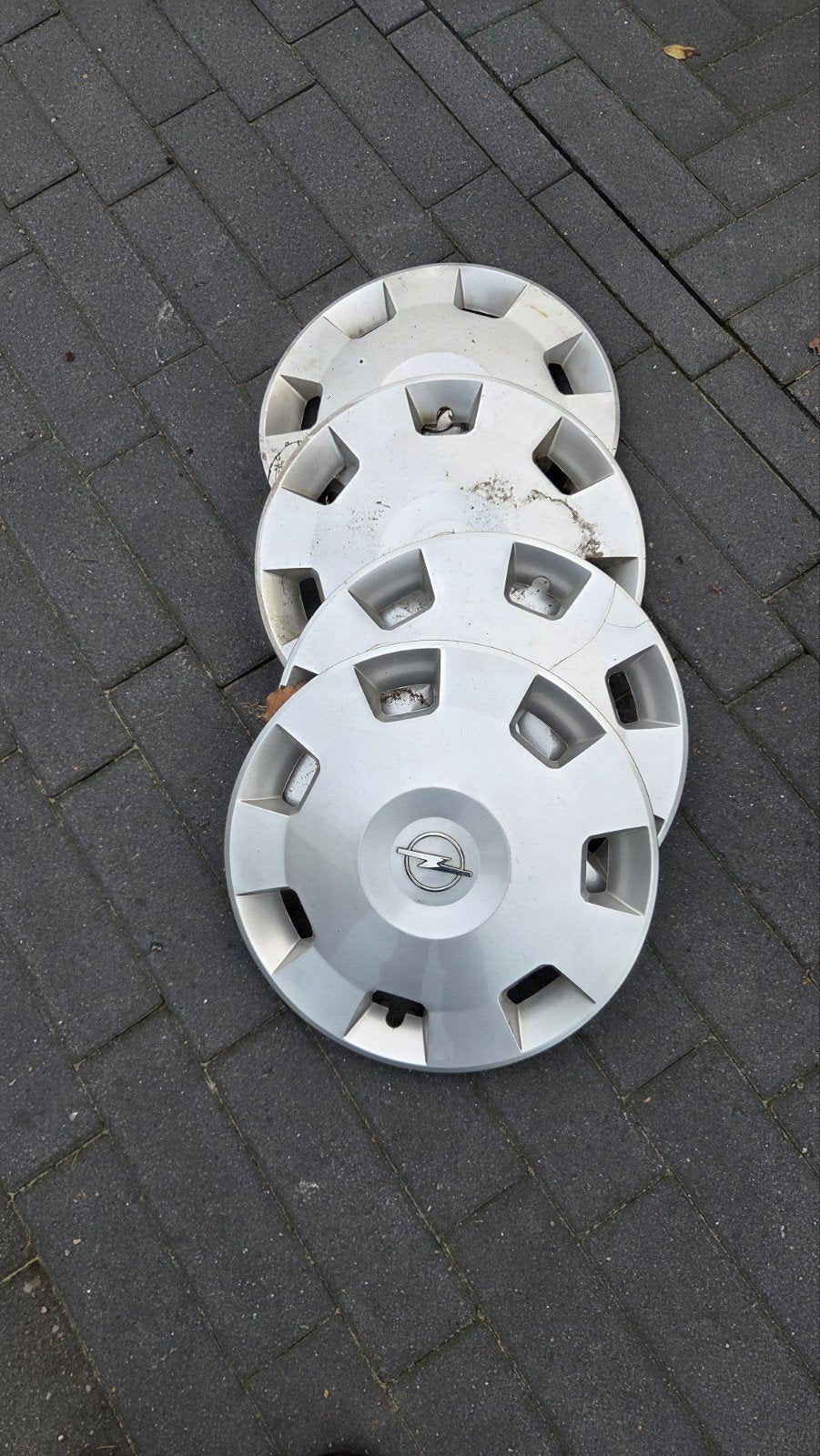 Set van 4 Opel wieldoppen, Auto diversen, Ophalen of Verzenden, Gebruikt
