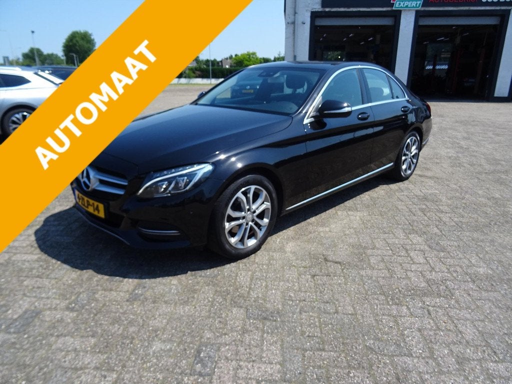 MERCEDES C-Klasse C180 156pk 7G-TRONIC, Auto's, Mercedes-Benz, 1325 kg, Leder en Stof, Zwart, 1595 cc