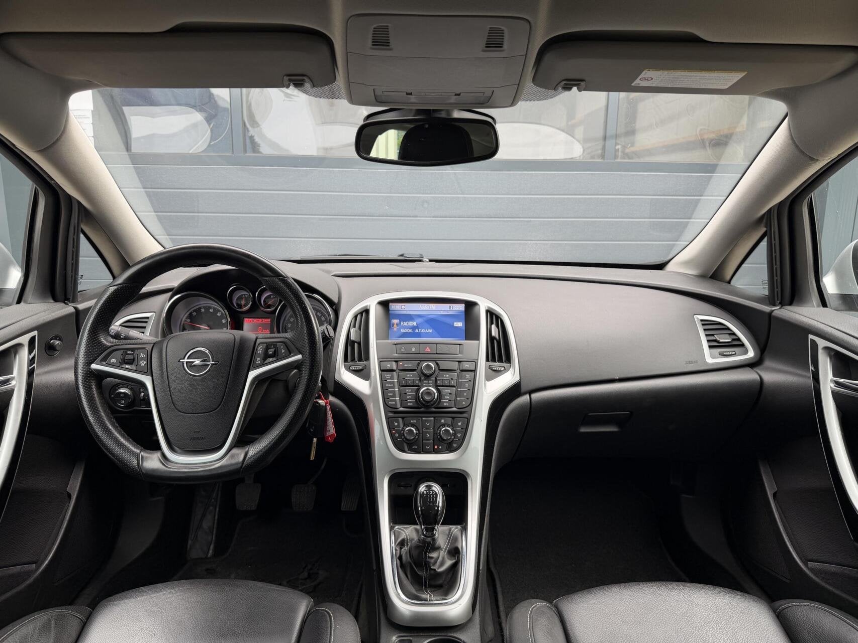 Opel Astra Sports Tourer 1.4 Turbo | Airco | Cruise, Voorwielaandrijving, Euro 5, Gebruikt, 4 cilinders