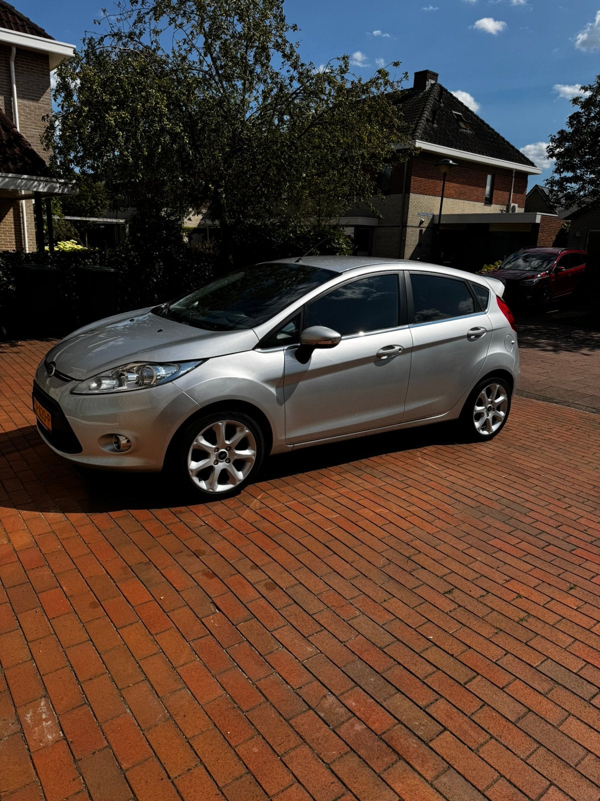 Ford Fiësta 1.25 60KW 5DR 2012 Grijs, Auto's, Ford, Voorwielaandrijving, 1242 cc, Handgeschakeld, 19 km/l