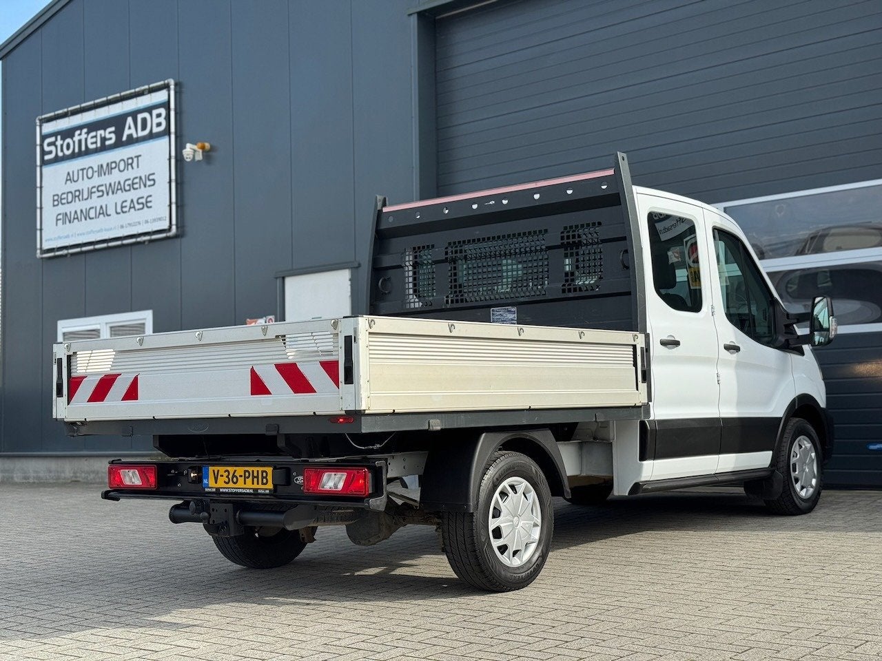Ford Transit 350 2.0 TDCI L2H1 DC Trend 4WD | Open laadbak |, Auto's, Bestelauto's, Keurmerk '100% Onderhouden', 4 cilinders, Wit