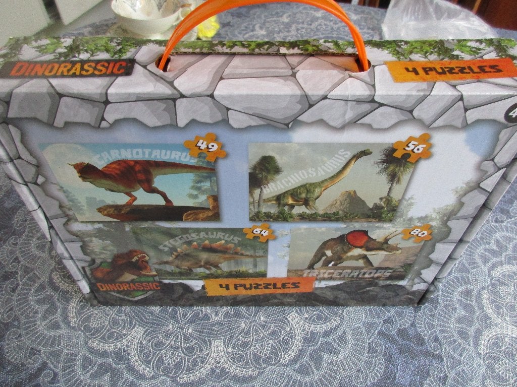 koffertje met 4 puzzels dinosaurussen - 49-54-64-80 stukjes, Ophalen of Verzenden, Meer dan 50 stukjes, Zo goed als nieuw, 4 tot 6 jaar
