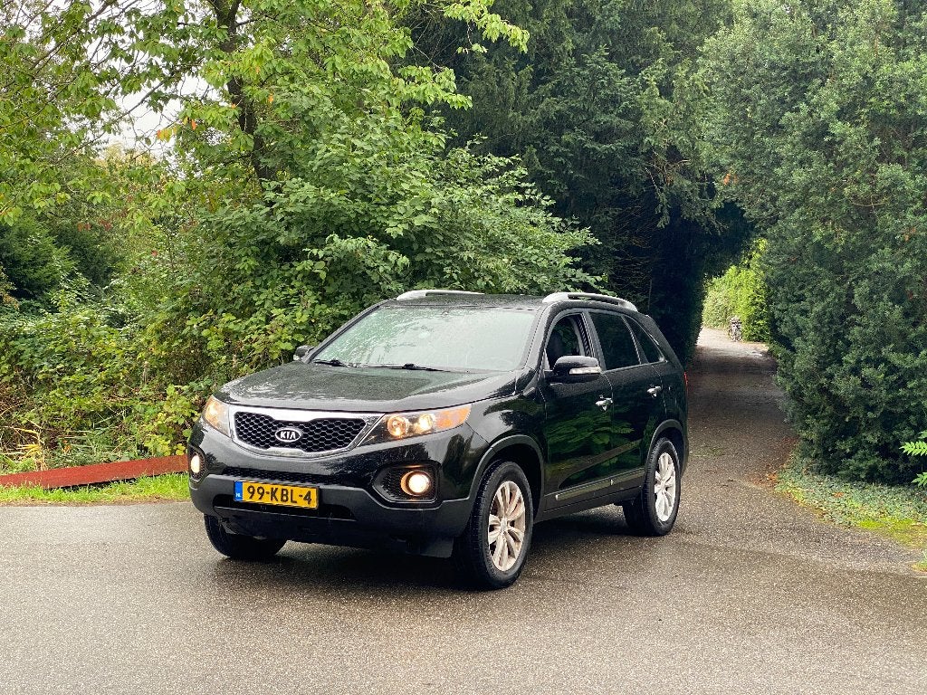 Kia Sorento 2009 2.4 X-ecutive Air con cruise con, Auto's, Voorwielaandrijving, 1610 kg, Zwart, 4 cilinders