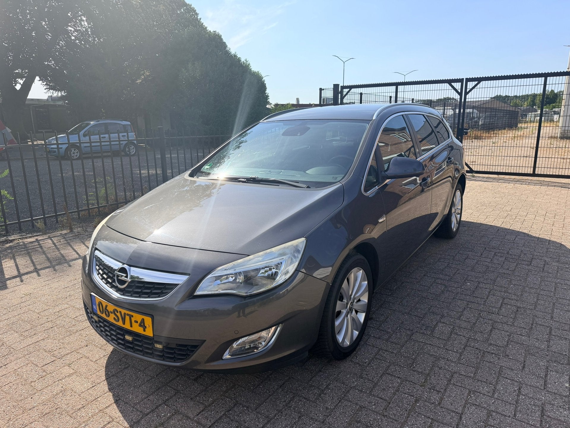 Opel Astra Sports Tourer 1.4 Turbo Cosmo, Auto's, Voorwielaandrijving, Euro 5, Stof, Gebruikt