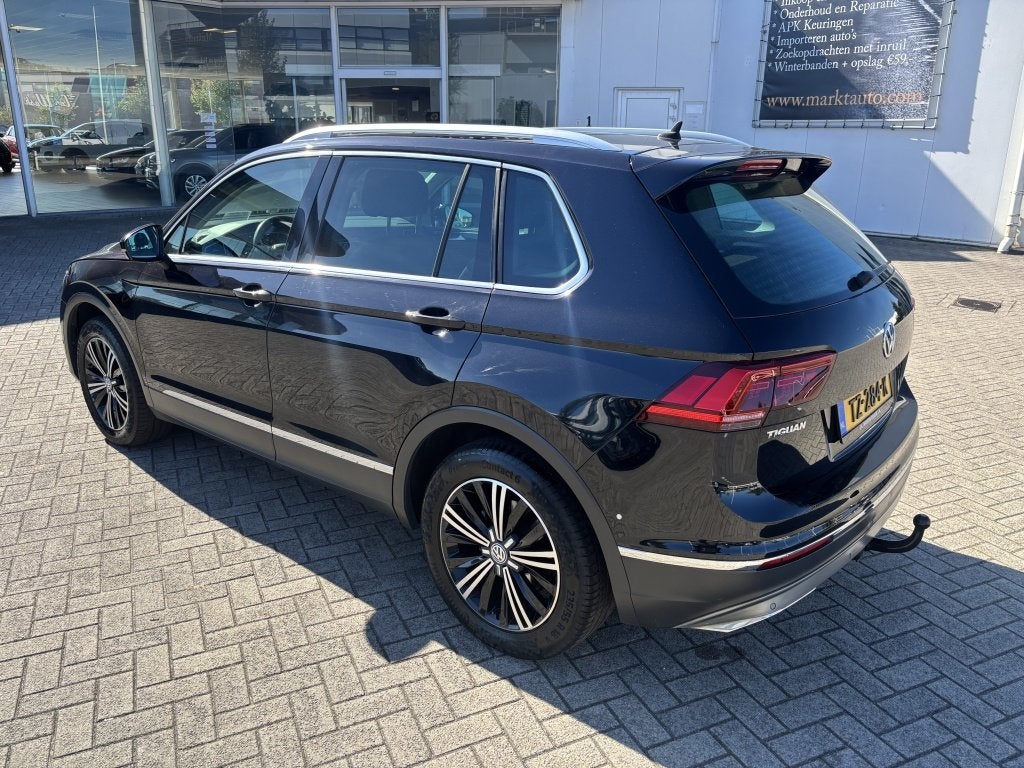Volkswagen Tiguan 2.0 TSI 4Motion Highline Trekhaak Camera C, Auto's, Automaat, Dealer onderhouden, Gebruikt, 4 cilinders