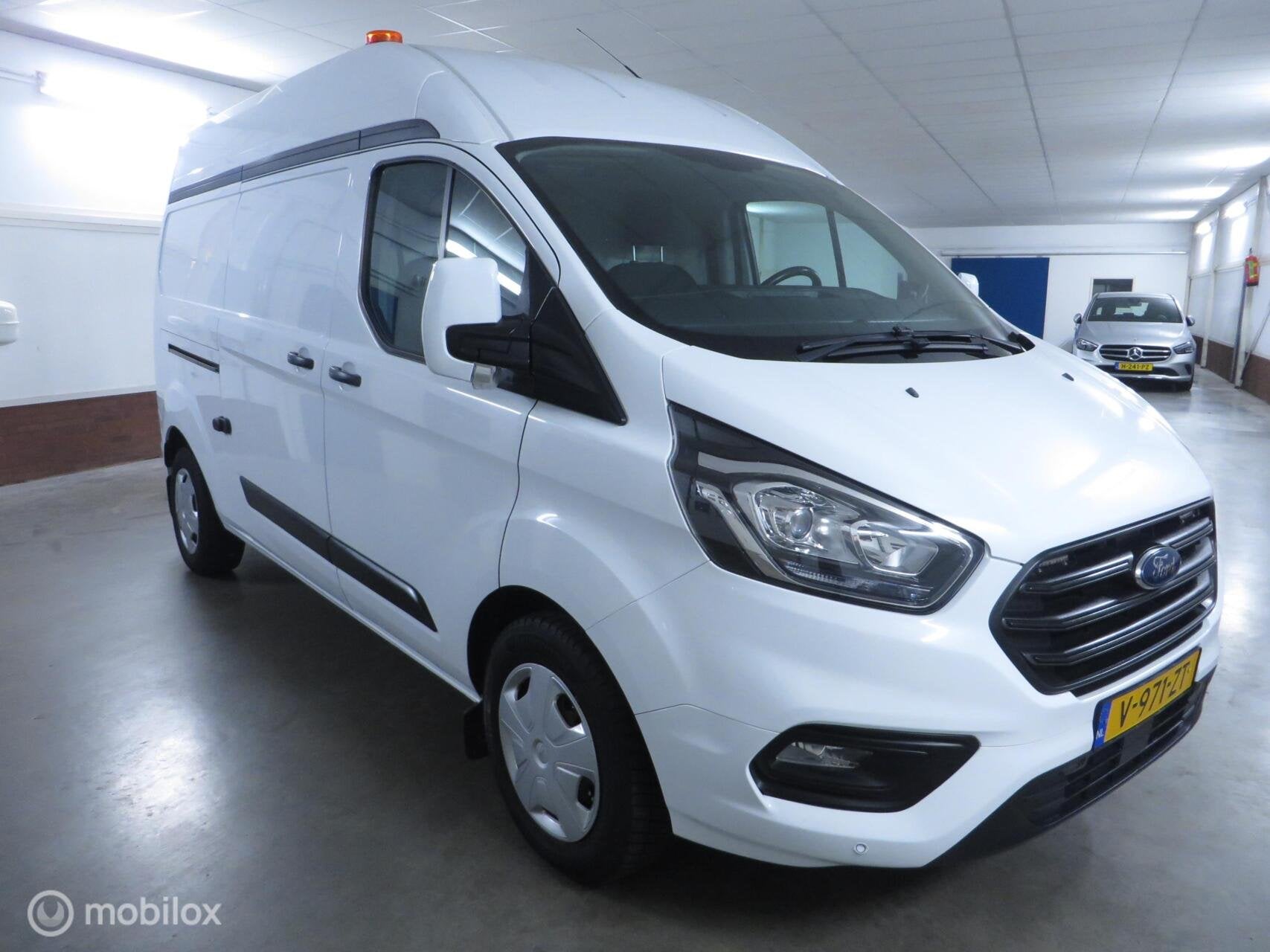 Ford Transit Custom 320 2.0 TDCI L2H2 Trend, Auto's, Gebruikt, Euro 6, 4 cilinders, Wit