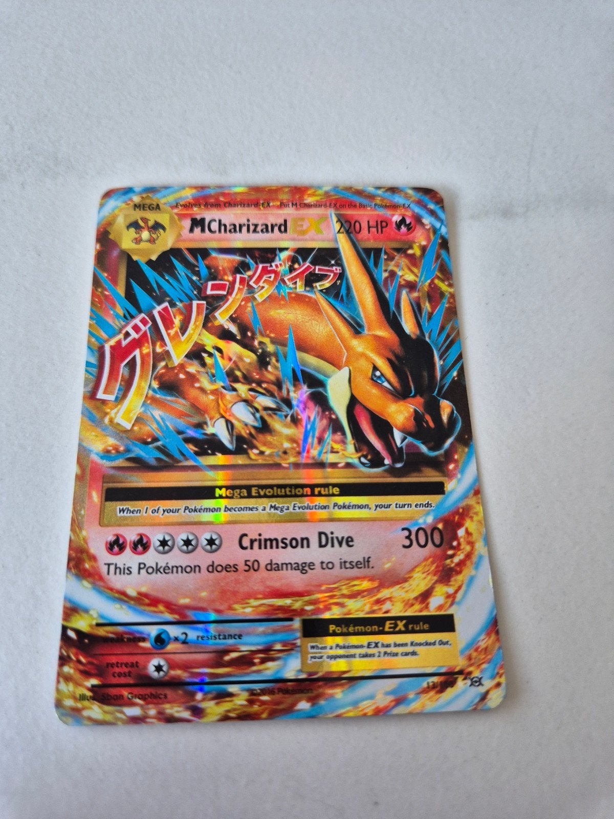 M Charizard EX Pokémon Kaart 220 HP - Holo Foil, Ophalen of Verzenden, Gebruikt, Losse kaart, Foil