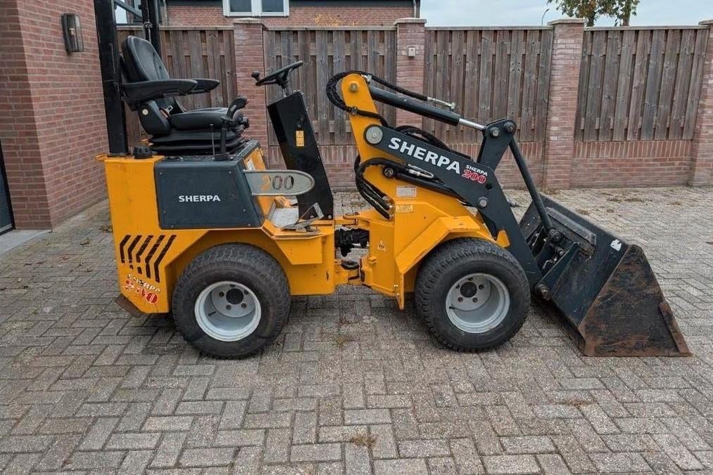 Sherpa 200 mini shovel / wiellader, Ophalen, Gebruikt