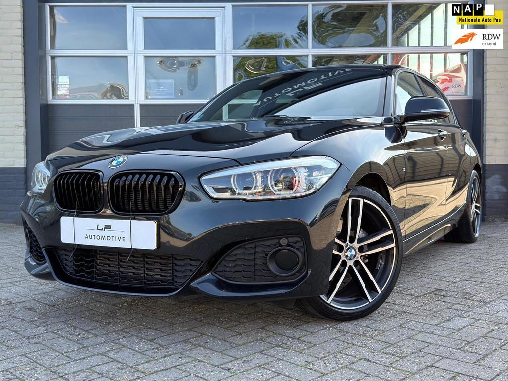 BMW 1-serie 118i High Exe / M-pakket / NL-auto / Automaat, Gebruikt, Zwart, Bedrijf, 650 kg