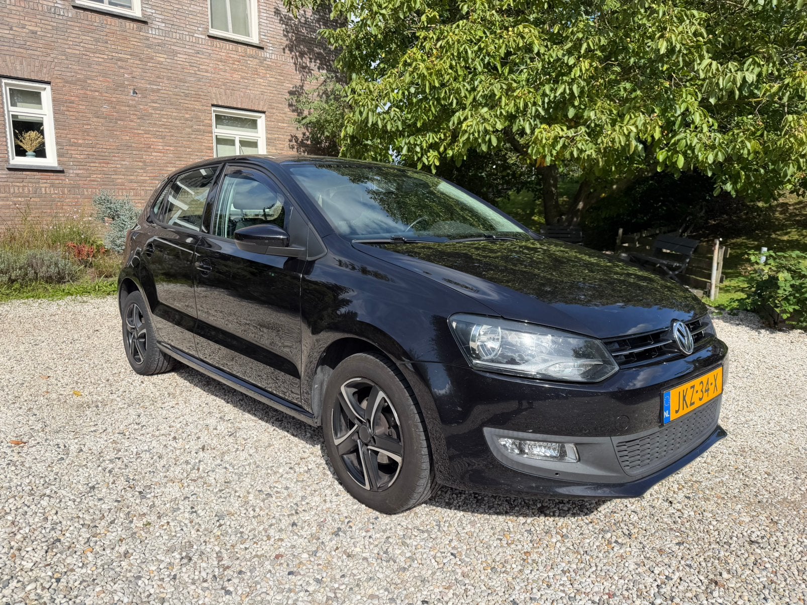 Volkswagen Polo 1.2-12V Comfortline *MFS*TREKHAAK*AIRCO L.Km, Voorwielaandrijving, 967 kg, 1198 cc, Zwart