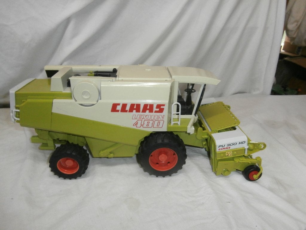 Bruder Claas Lexion 480 met PU 300 HD grasbek, Kinderen en Baby's, Speelgoed | Speelgoedvoertuigen, Ophalen, Gebruikt