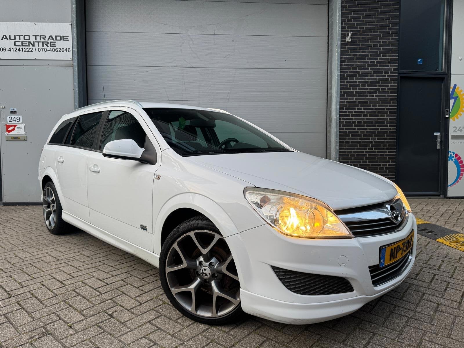 Opel Astra Wagon 1.6 Cosmo OPC Line, Auto's, Voorwielaandrijving, Gebruikt, Zwart, 116 pk