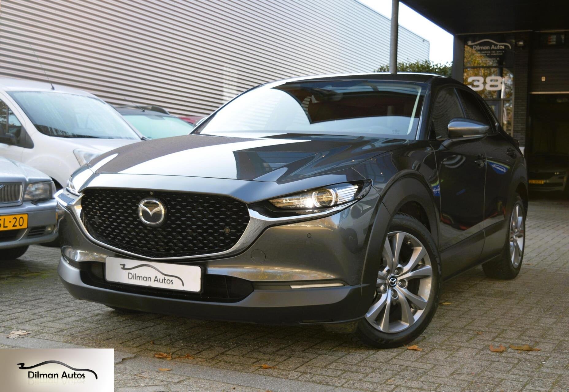 Mazda CX-30 2.0 e-SkyActiv M Hybrid Bose|Camera|Leder|Head!, 1998 cc, Zwart, 4 cilinders, Met garantie (alle)