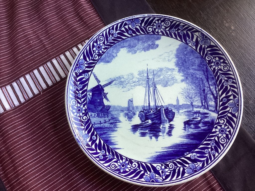 Delfts blauw wandbord, Ophalen