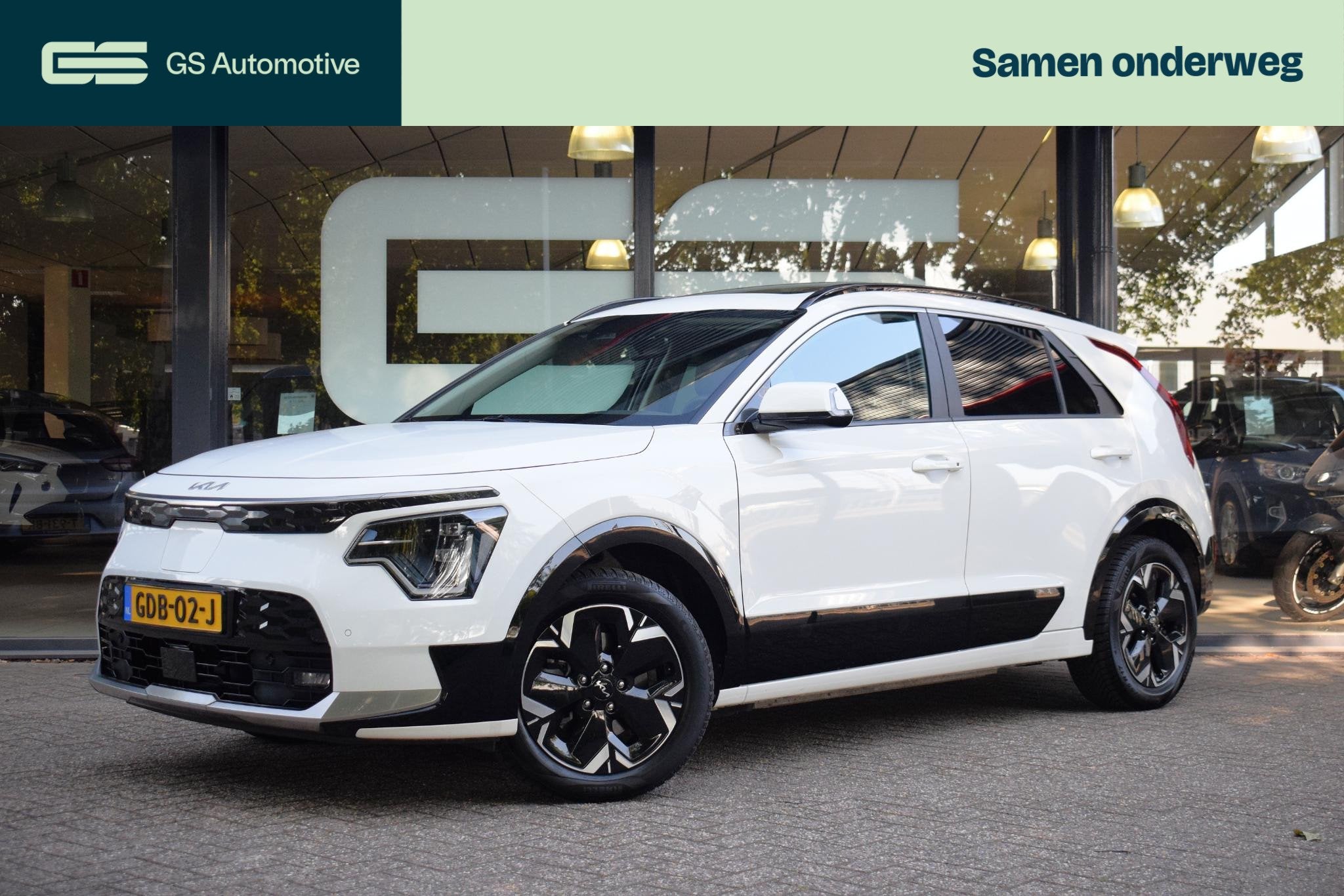 Kia Niro EV DynamicPlusLine 64.8 kWh |SCHUIFDAK|TREKHAAK|CAM, Gebruikt, 750 kg, 1657 kg, Wit