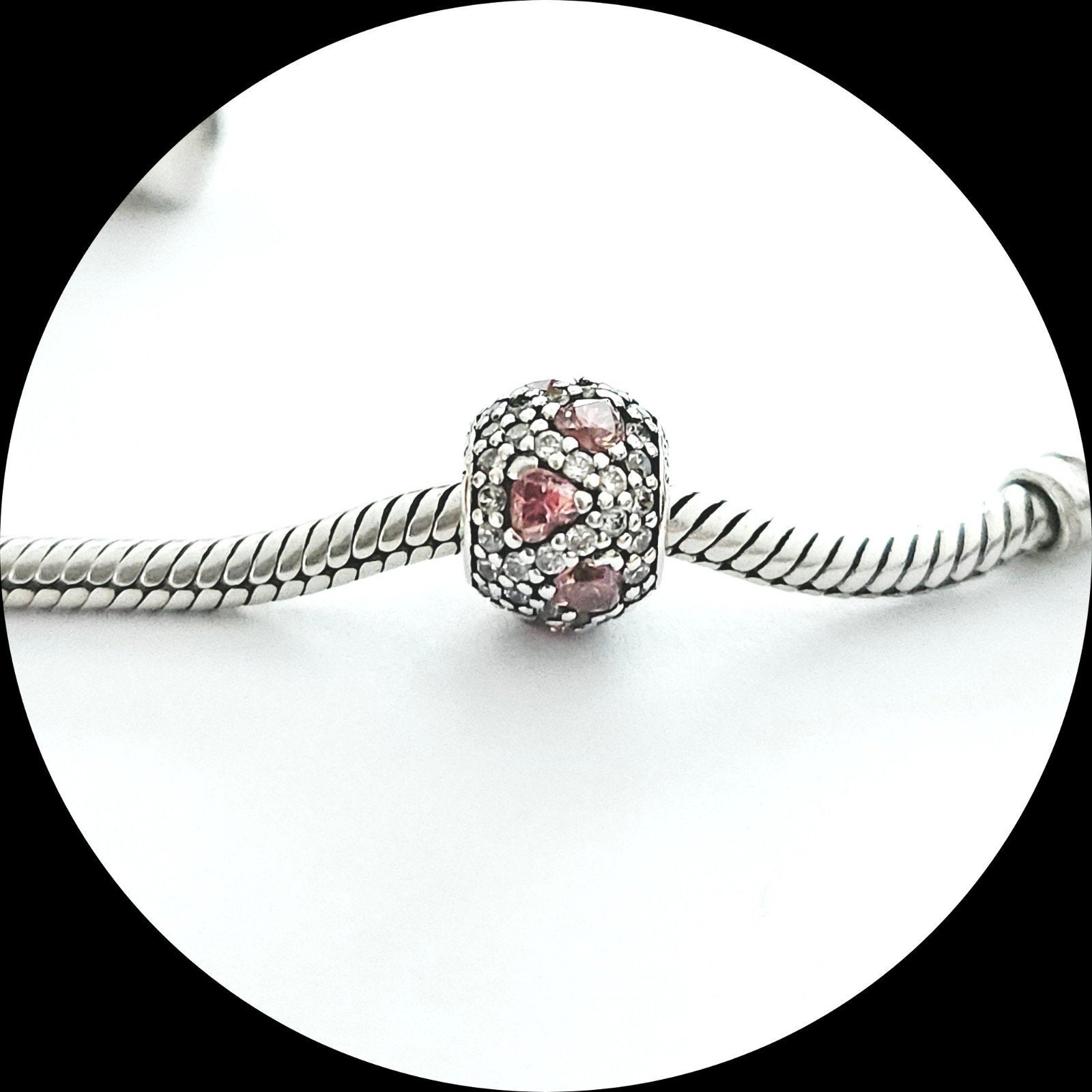 Pandora Shimmering Heart 791249CZS / roze Hartjes retired, Pandora, Ophalen of Verzenden, Zo goed als nieuw, 1 bedel