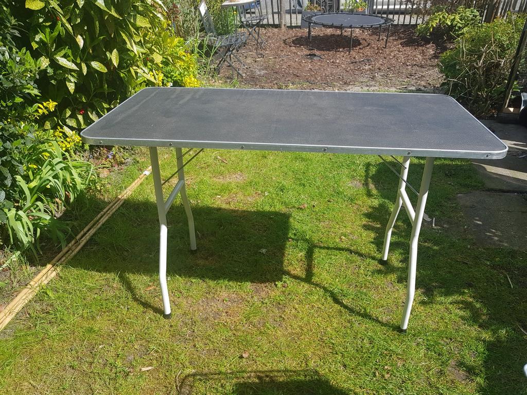 Trimtafel voor honden, Ophalen