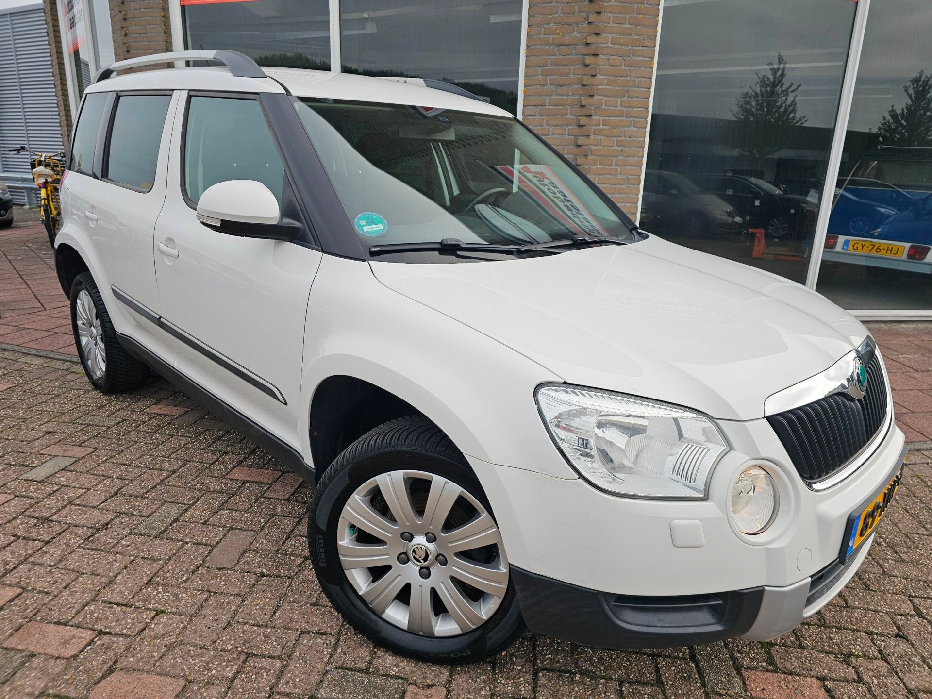 Skoda Yeti 1.2 TSI Ambition Arctic - Navi - Cruise - Electr, Voorwielaandrijving, Euro 5, Stof, Gebruikt