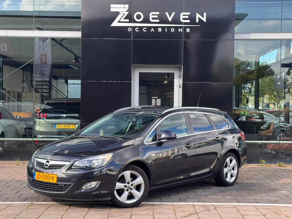 Opel Astra Sports Tourer 1.4 Turbo Cosmo, Auto's, Opel, Voorwielaandrijving, Euro 5, Stof, Gebruikt