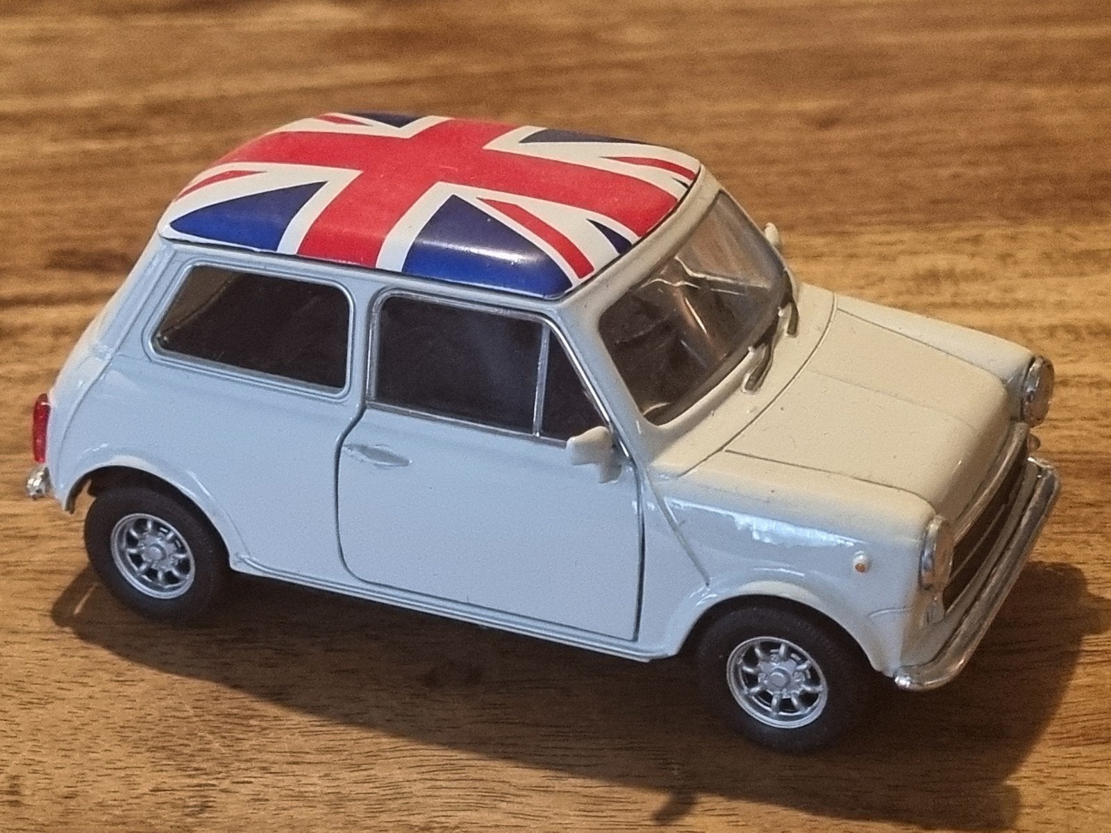Welly Mini Cooper 1996 modelauto met Union Jack dak, Ophalen of Verzenden, Zo goed als nieuw, Auto, Overige merken