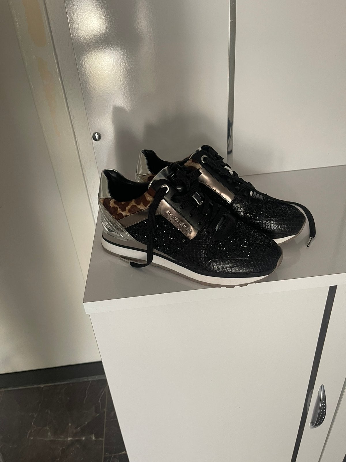 Michael Kors, Ophalen, Zo goed als nieuw