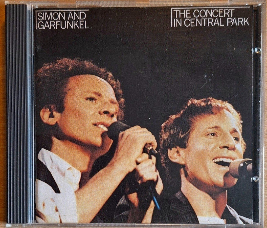 Simon & Garfunkel - The Concert in Central Park CD, Ophalen of Verzenden, Zo goed als nieuw, Live-album, Inclusief boekje