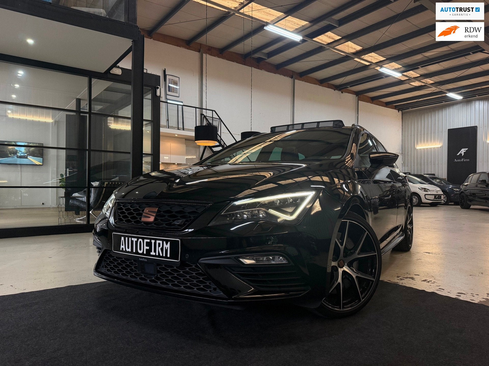 Seat Leon ST 2.0 TSI 4DRIVE CUPRA Dealer Onderhouden Automaa, Auto's, Automaat, Dealer onderhouden, Gebruikt, Zwart