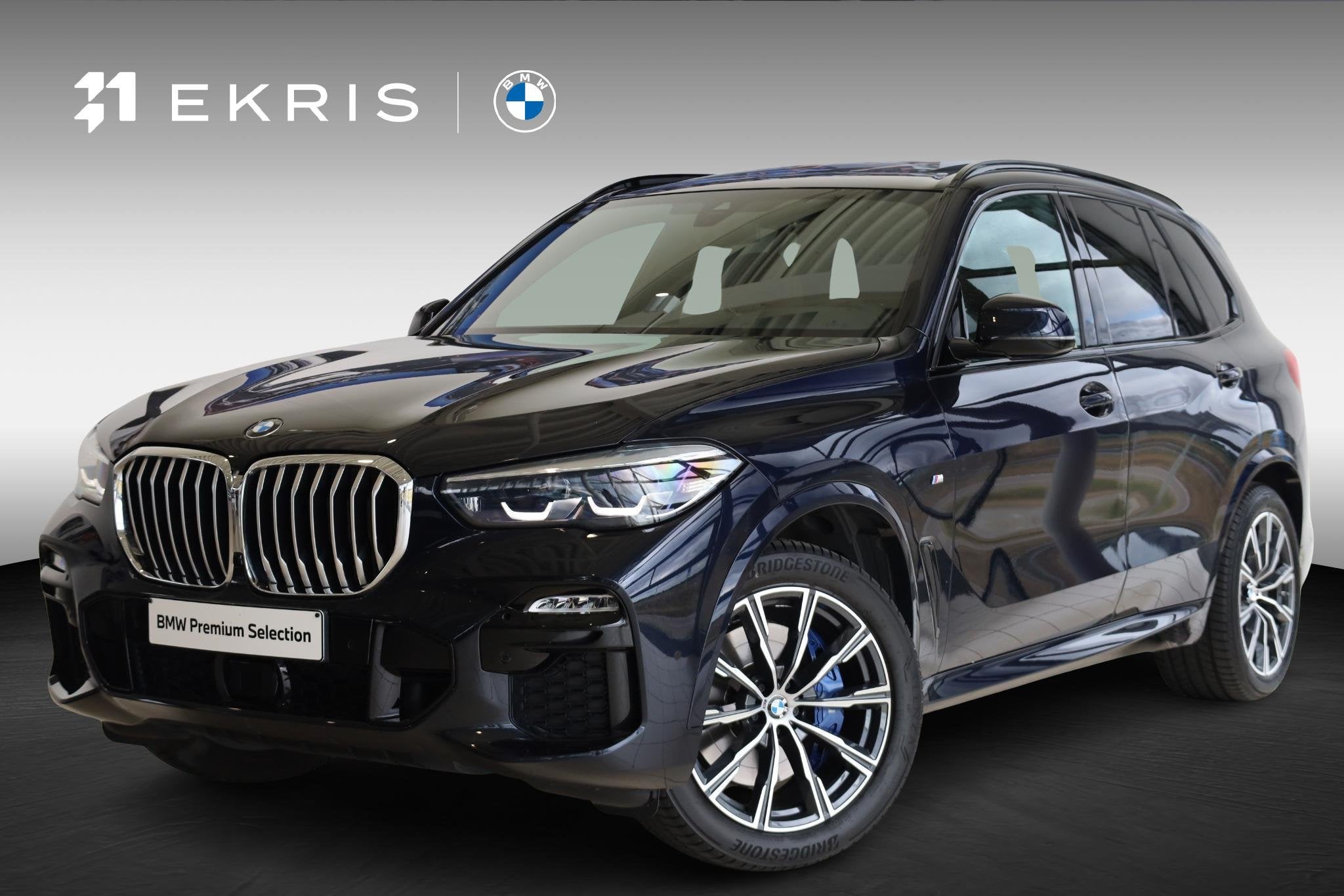 BMW X5 xDrive40i High Executive | M Sportpakket | Panorama D, Auto's, Stof, Gebruikt, Met garantie (alle), Zwart